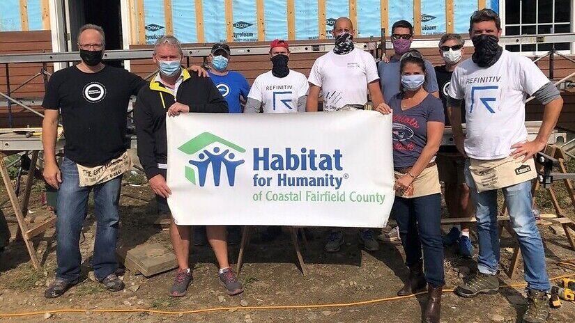 Refinitiv employees working with Habitat for Humanity to help end housing poverty.