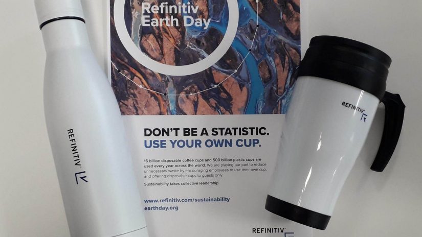 A Refinitiv social impact initiative where a Refinitiv Earth Day poster and two reusable mugs appear to encourage sustainable actions by their employees. 
